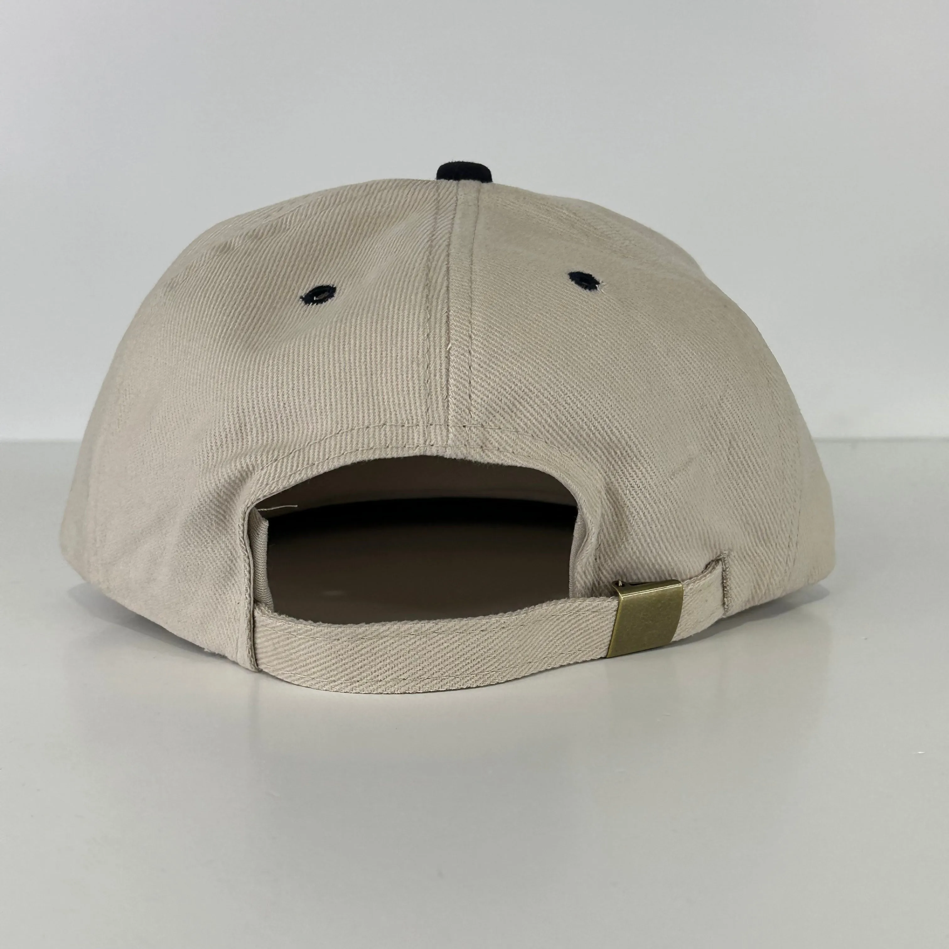 AA is for quitters in navy thread on khaki and navy Strapback hat custom embroidery