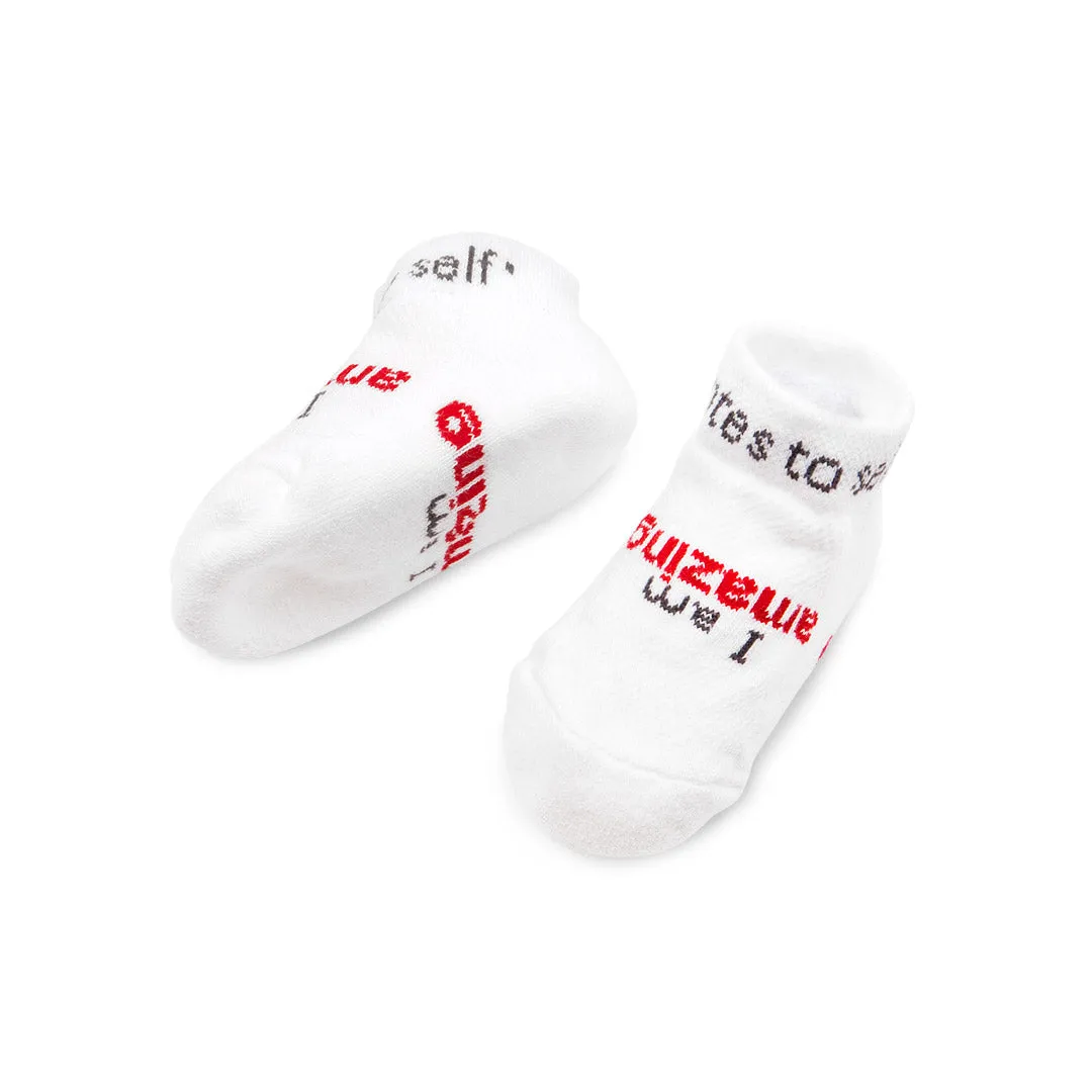 I am amazing® white baby socks with red words (3-12 mo)